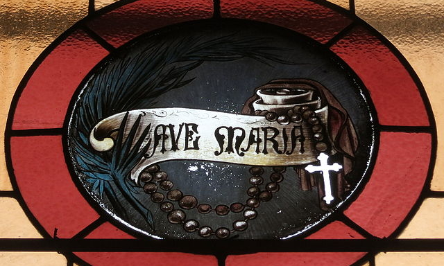 Stained glass window of the Rosary