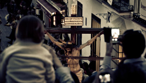 Praying before a Crucifix.