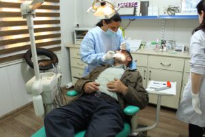 Dr. Widad Operating on a Patient at the Clinic