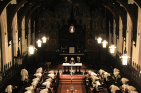 Chapel interior with brothers praying